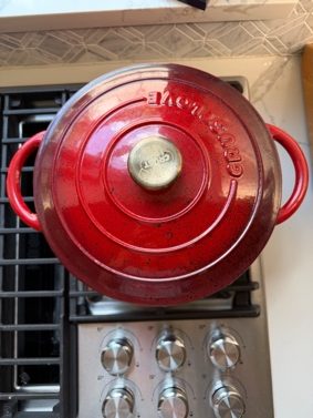 Red Dutch oven on the stovetop